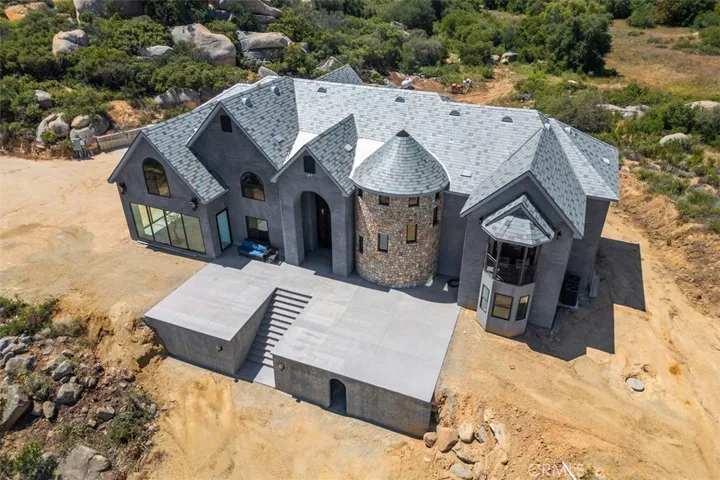 Significant exterior enhancements have just been completed, elevating the front presentation of this Impressive Custom built estate. The stone on the turret was quarried from the property, with an abundant of additional stone available on-site, you can complete futures enhancements saving significantly on material costs