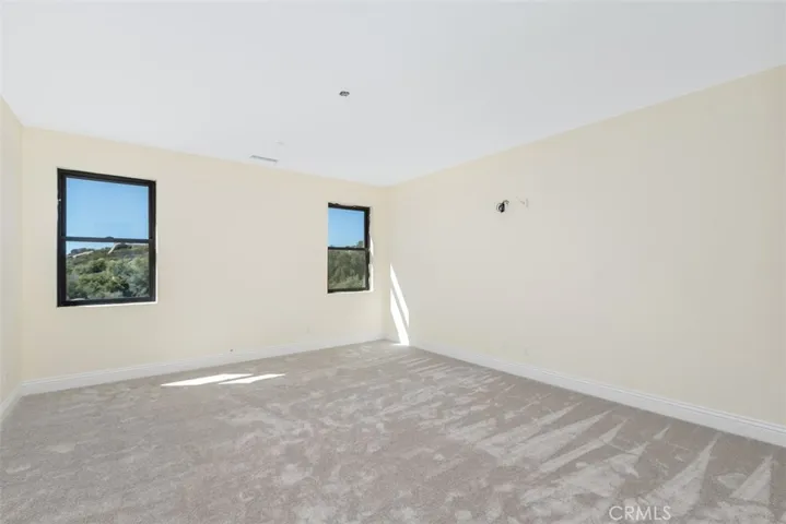 upstairs theatre room can also be as an office or converted to another bedroom by adding a closet