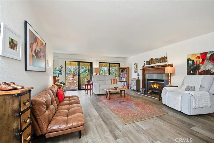 Bright open living area with two sliding doors to let outside in.