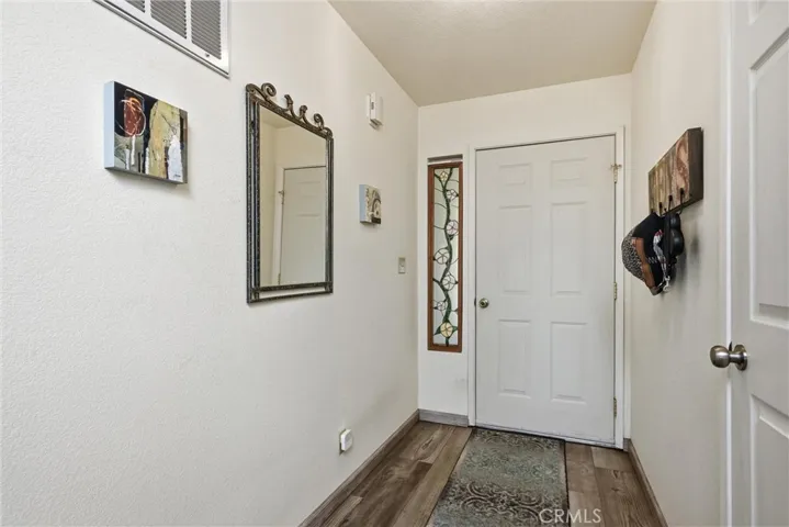 Gracious entry hall with closet.