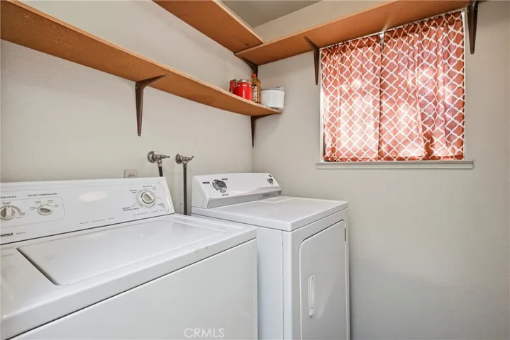 Convenient laundry between garage and kitchen.