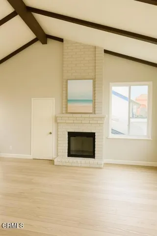 FAMILY ROOM FIREPLACE AND NEW FLOORING
