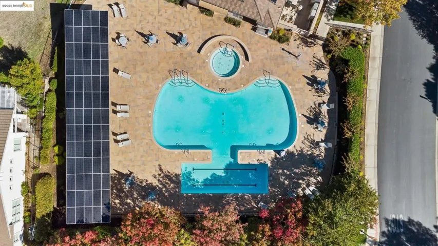 Drone / aerial view of a pool area