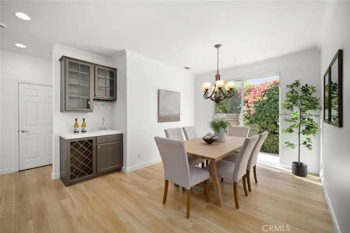 Dining area with slider to side yard