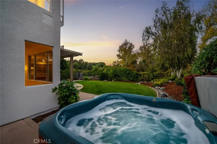 Side yard with spa