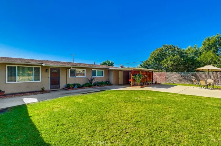 Yard behind front fence.