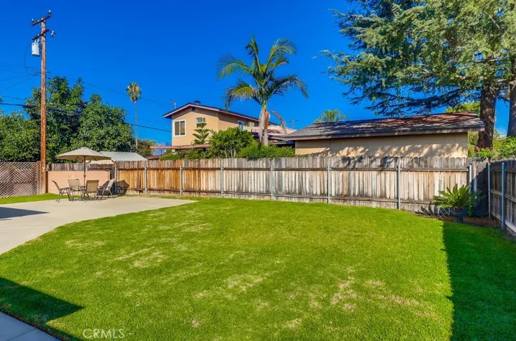 Yard behind front fence.
