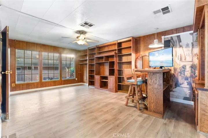 Light & bright Den. Off of living room. Has potential to be a 3rd bedroom!