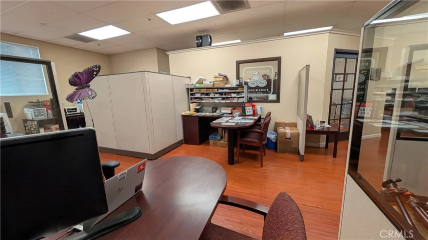 Enclosed office view and middle area