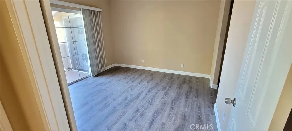 Primary Bedroom with Sliding Door to Balcony!