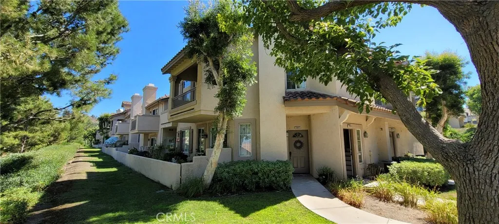 Beautiful Entryway with Lush Trees on Quinn Drive!