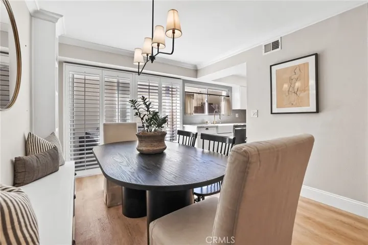 dining room with built in bench and cabinets
