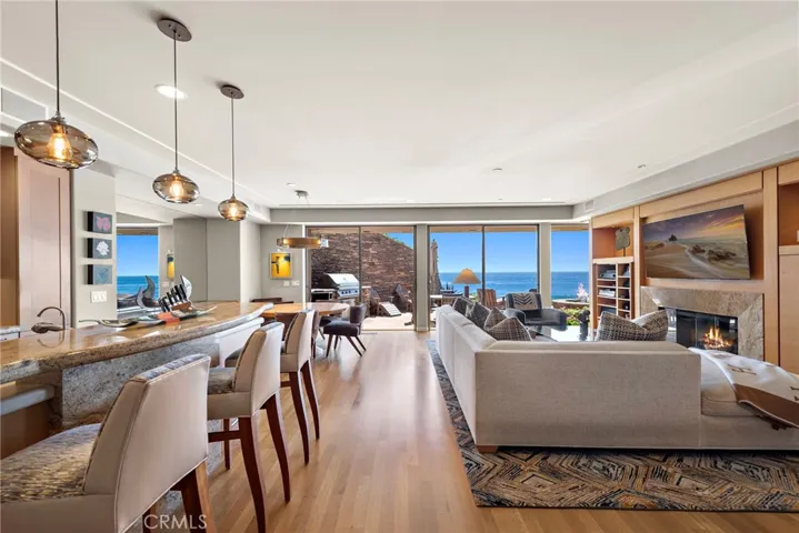 Between the gourmet kitchen, spacious dining area with beautiful built-ins, and the living room with intimate fireplace, the open concept layout provides the perfect space for entertaining.