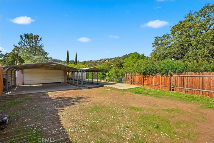 Driveway and garage area is huge, flat, fenced and completely usable.