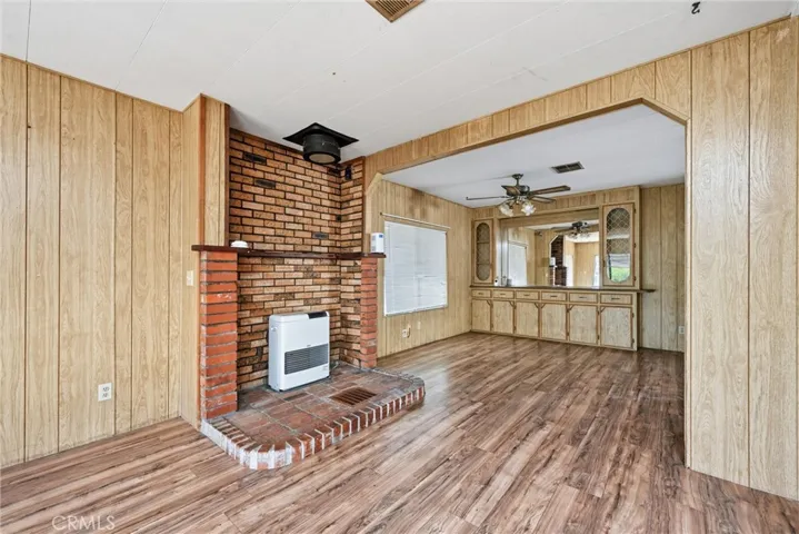 Living area looking toward dining area built in hutch.
