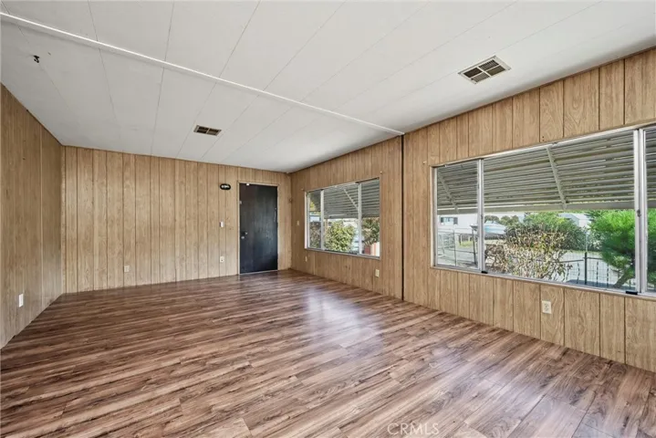 Large living area with solid surface floors.