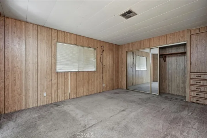 Primary bedroom with large closet space.