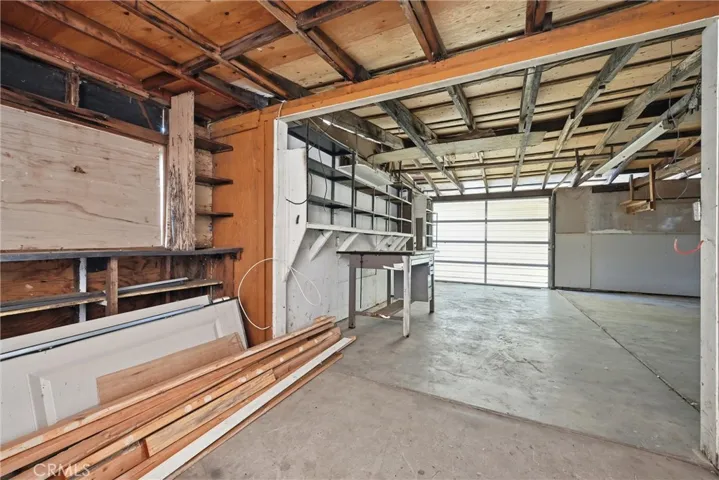 Huge garage and attached workshop.