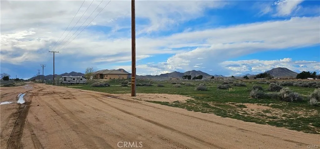 Dirt Road Entrance to Vacant Lot at 0 Zuni Rd, On Right Side