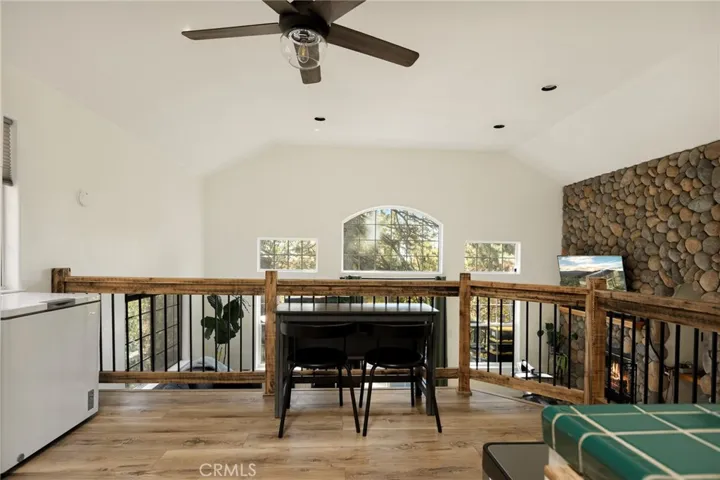 Dining area overlooking living room pic #2