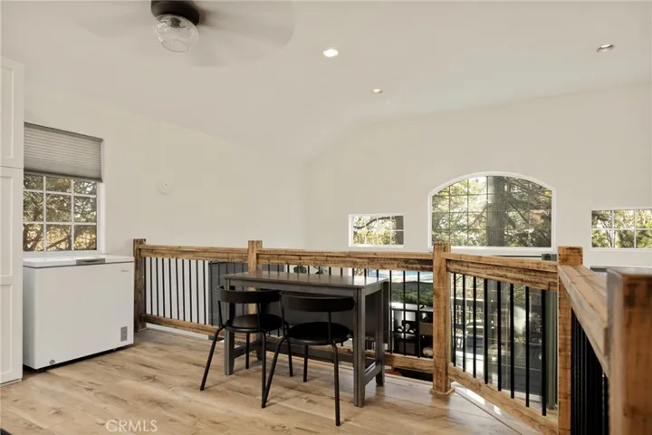 Dining area overlooking living room pic #3