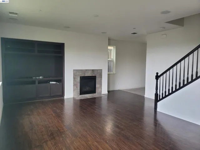 Fireplace and built-in stereo surround sound system throughout.