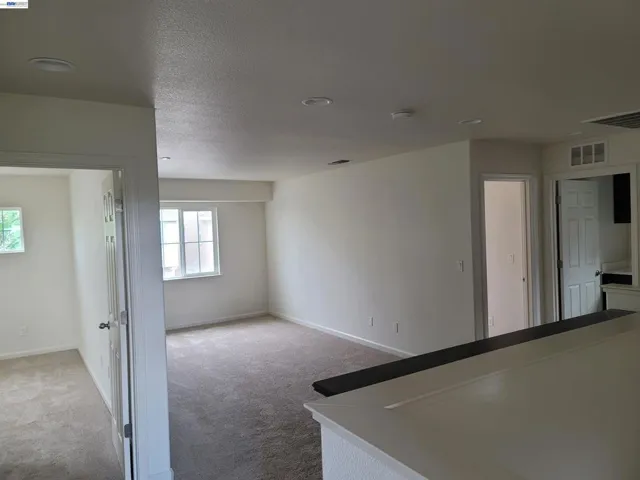 Open space separates the 2 bedrooms