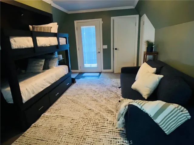 Loft showing door to 2nd deck and entry from Holiday