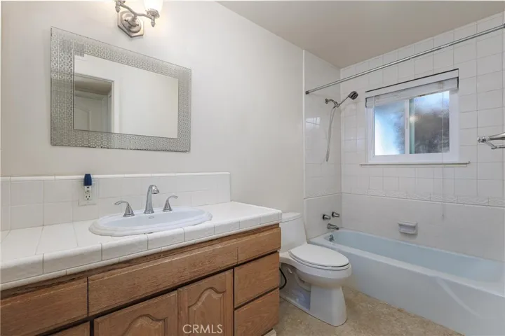 Second bathroom located in hall.