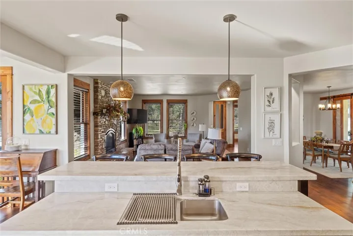 View doing dishes into the whole downstairs