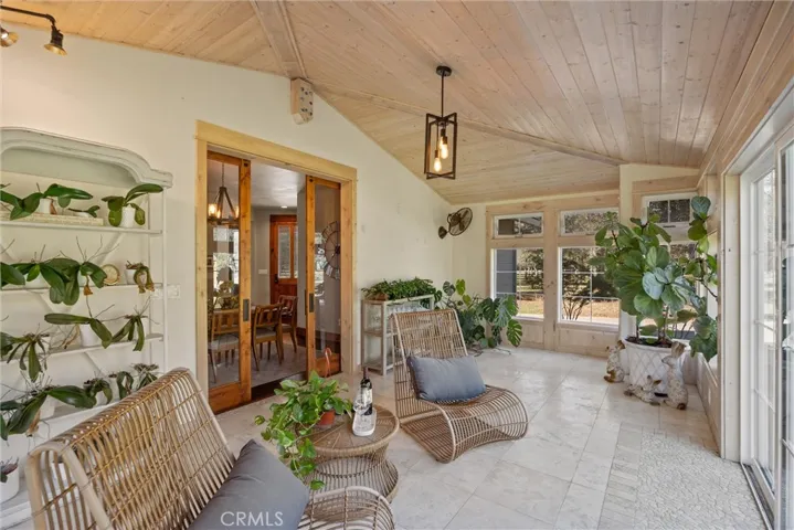 Sunroom with slider glass barn doors