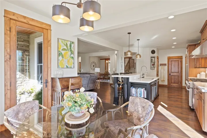 Breakfast nook looking into kitchen and living room
