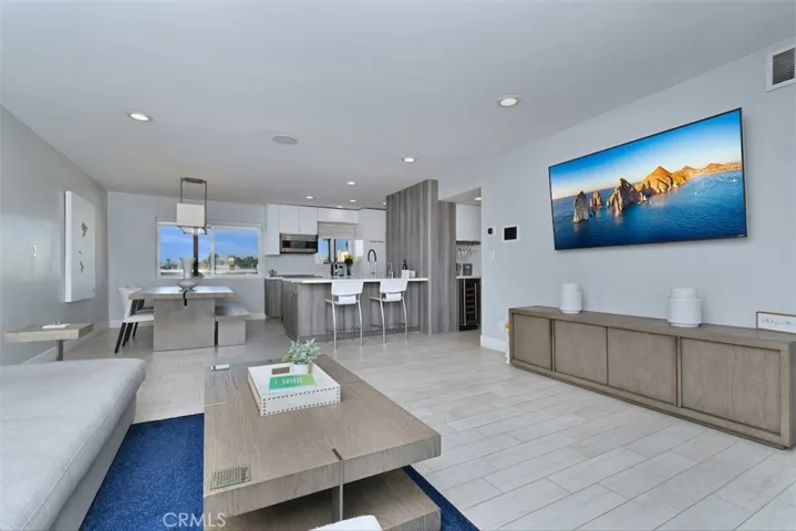 Living, dining, kitchen.