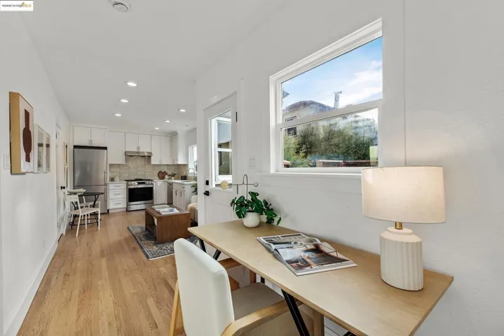 Dining room featuring light wood-type flooring and recessed lighting