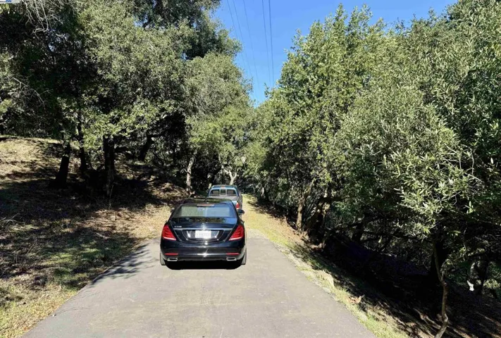 Lower parcel parking - parcel begins at the end of the driveways.