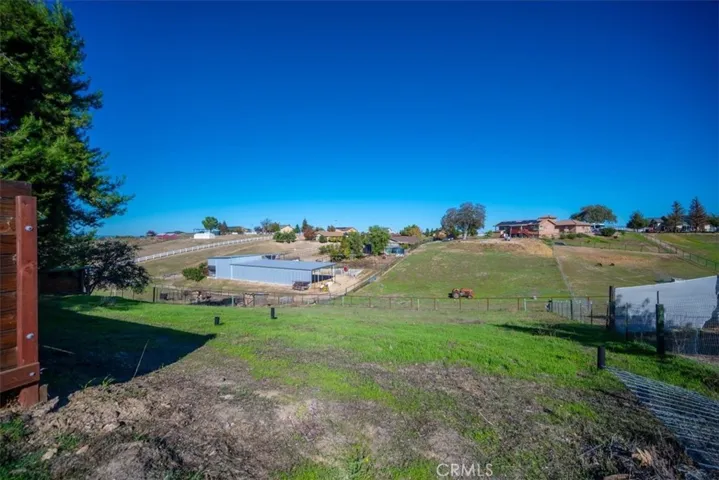 back field on property behind fenced backyard.