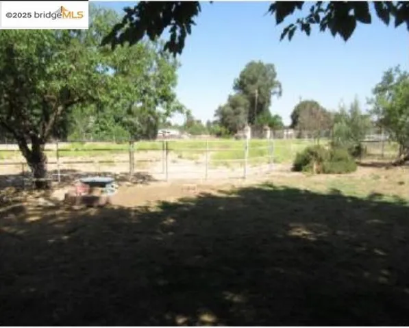 View of yard with a view of rural / pastoral area