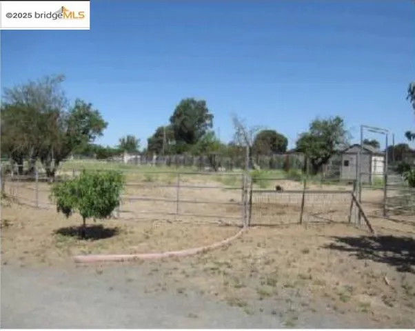 View of yard featuring a view of rural / pastoral area