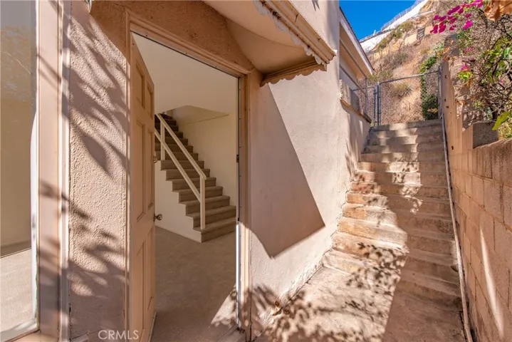 Side entrance to downstairs primary suite