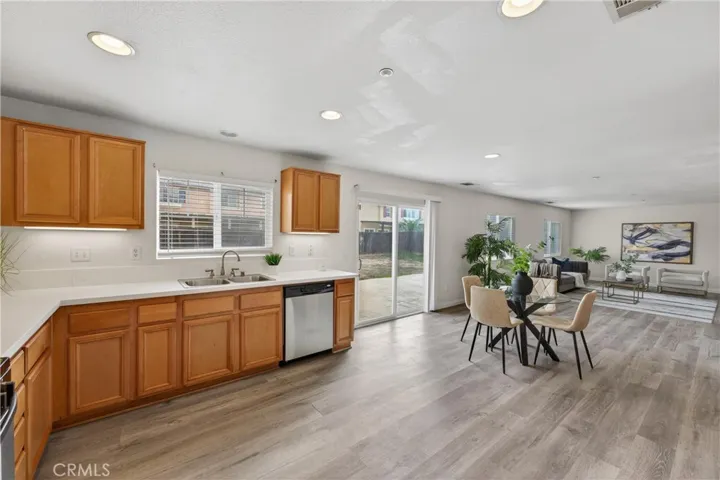 Open layout connects kitchen, dining, and family spaces