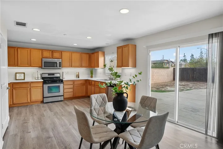 Spacious kitchen opens to the backyard