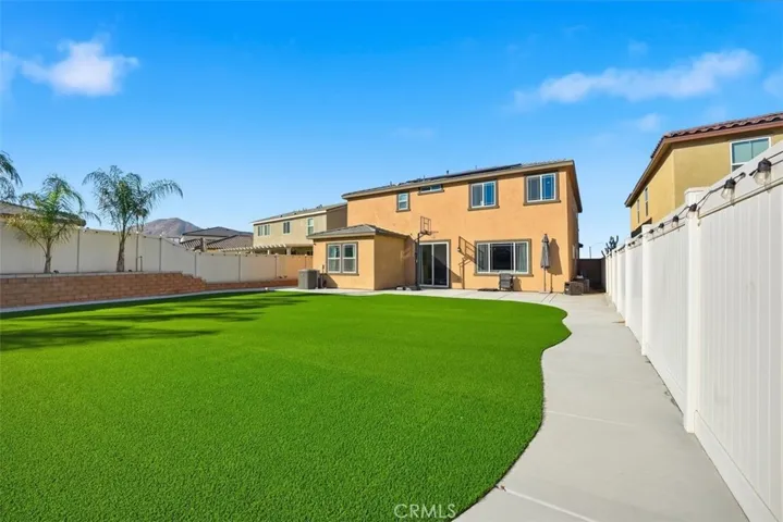 Fully  landscaped with  artifical turf lawn