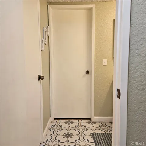 Second powder room door