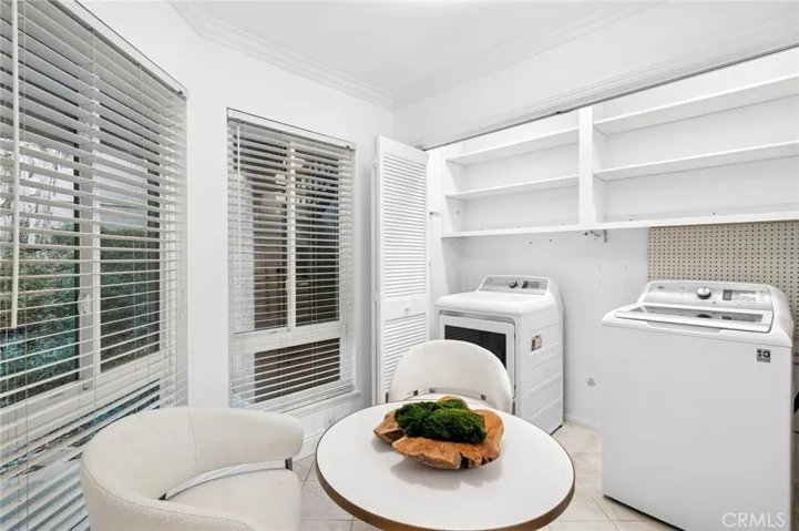Additional amenities include in-unit laundry, one car detached garage