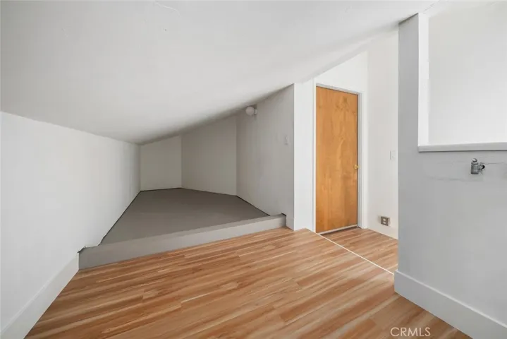 Storage off kitchen and above garage.
