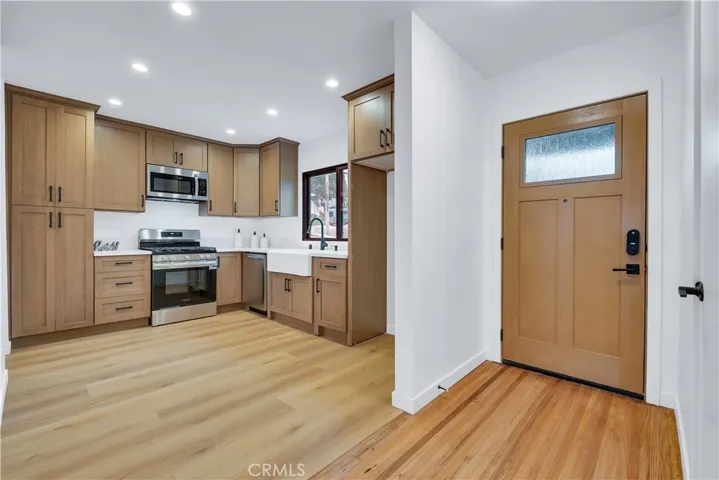 Your Kitchen has new luxury laminated flooring, new recessed lighting that flow perfectly with your new high-end Signet Fiberglass entry door.