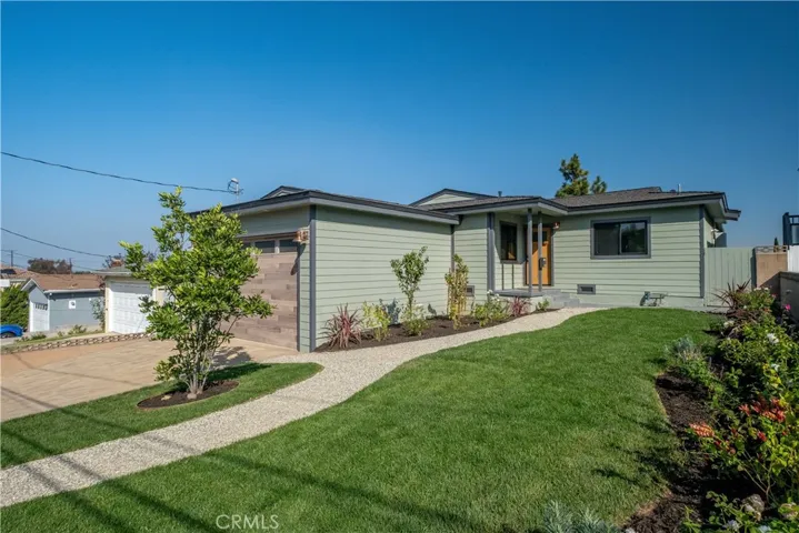 Striking curb appeal sets the stage for this lovely home.