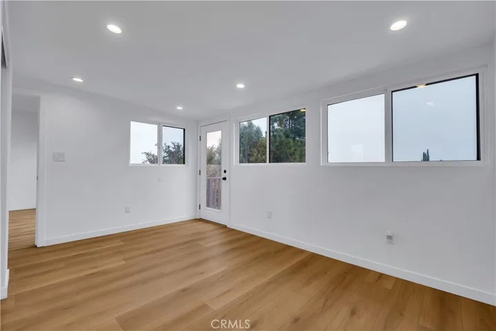 Converted Sunroom - Bedroom #4/Office with views, new luxury laminated floorin