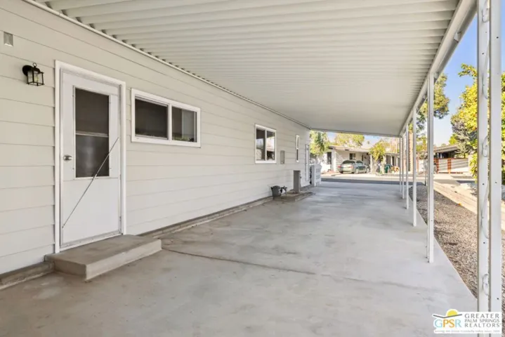 Carport door and driveway