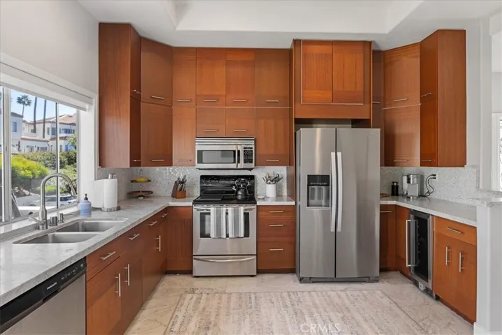 These photos are very recent with tenant's furnishings but refrigerator is included.